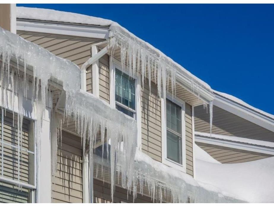 Numerous ice dams formed on the edge on a roof
